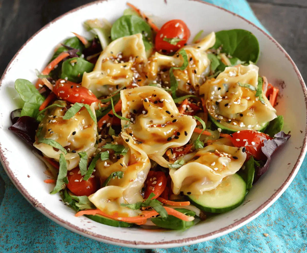 Delicious potsticker salad with crispy potstickers, fresh vegetables, and tangy dressing ready to serve
