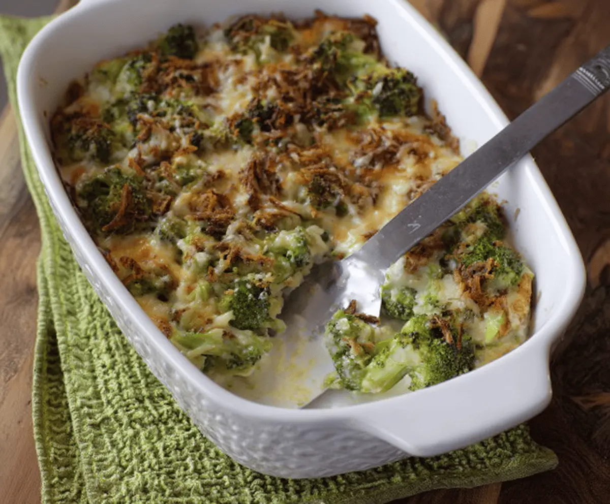 Delicious broccoli casserole baked with cheese and creamy sauce, perfect for family dinner.
