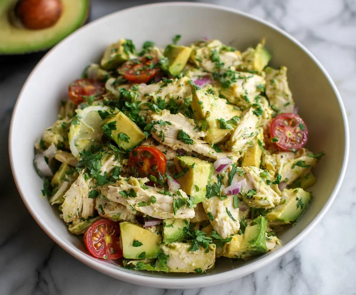 Healthy avocado chicken salad with fresh ingredients, high protein, no mayonnaise, perfect for a nutritious meal.